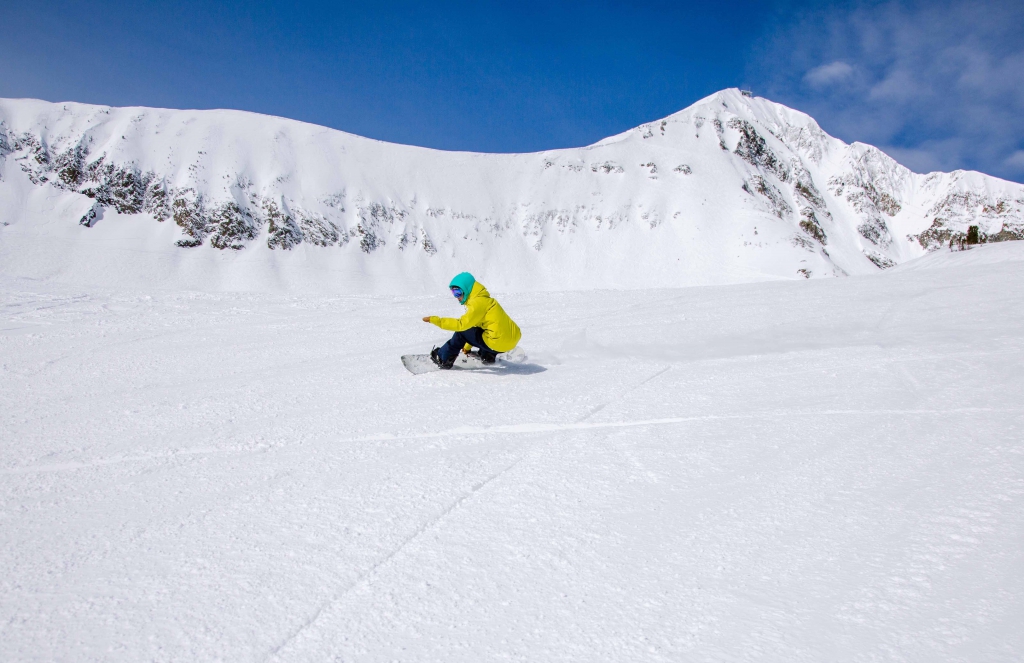 AASI team member Amy Gan snowboards at Big Sky in Montana